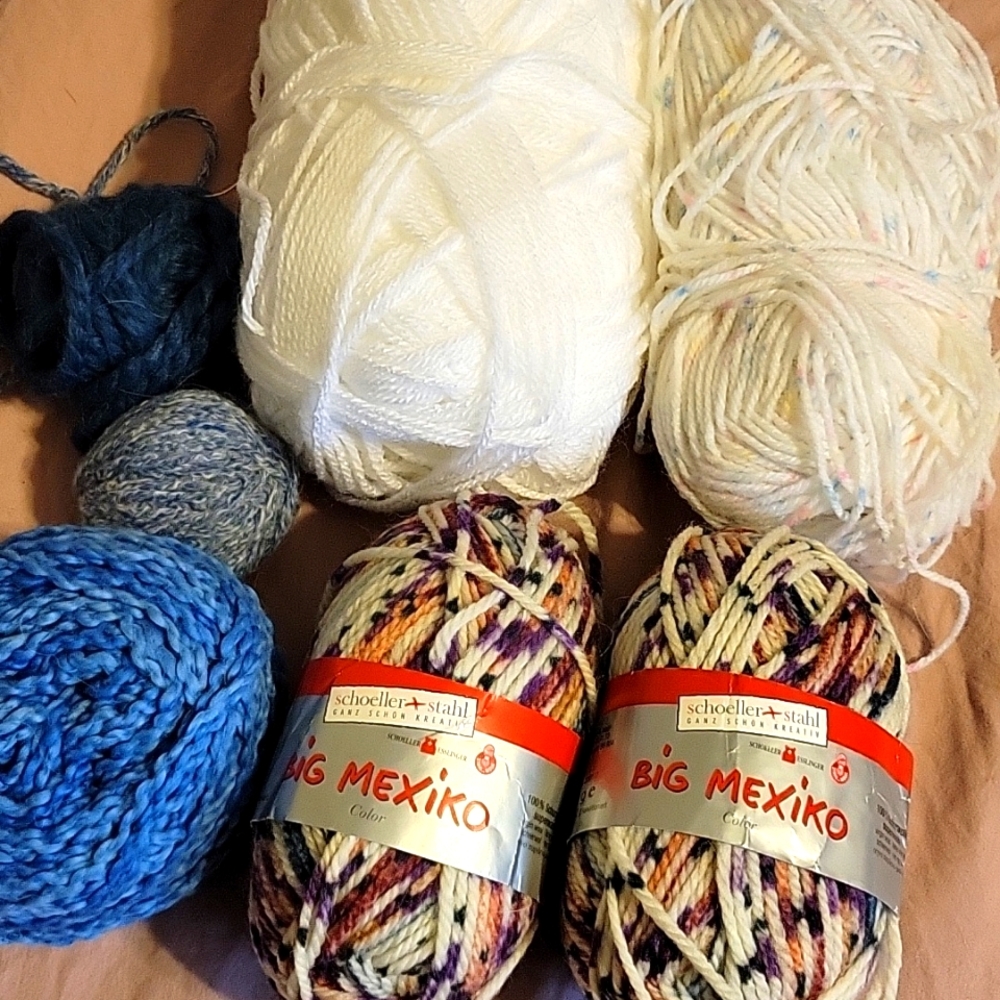 7 partial or full skeins of yarn